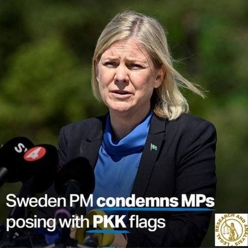 Sweden's PM condemns posing with PKK Flags.